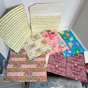 Vintage wrapping paper sheets, seven sheets some cut some whole